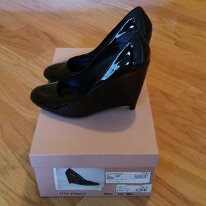 Miu Miu black patent leather wedges